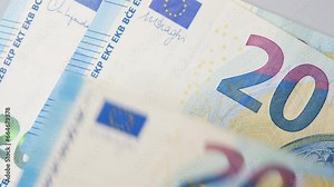 Twenty euro background. Close up on Many euro money bills. EU money banknotes. Money or European union currency concept. Man hand counting euros