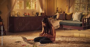 Focused Indian Girl Studying at Home: Engaged in Learning, Researching, Study Remotely for University Degree. Productive Young Female Entrepreneur Uses Computer. Wide Static Shot