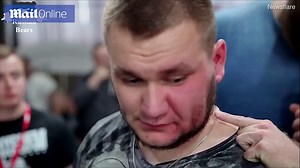 Men aggressively slap each other in Russian strength competition