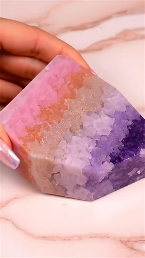 Nikkie Burns on Instagram: "These crystals don’t vanish they unfold. From rosy crack to silky violet smear, every layer reveals warm blush tones and cool haze. One flow. One smear. Real pressure shift. Follow @nikkie.burns.aus for color texture therapy. Comment “AURORA” for the link to my Aurora Alchemy prompt guide! #pixiecorequartz #asmr #explore #reels #noise"
