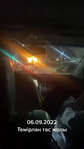 Nighttime Fire Engulfs Warehouse in Urban Scene