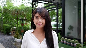 Download Close up portrait shot of beautiful young woman smiling with happy, enjoying lifestyle stylish attractive female looking to camera and having wide toothy charming smile at outdoor for free