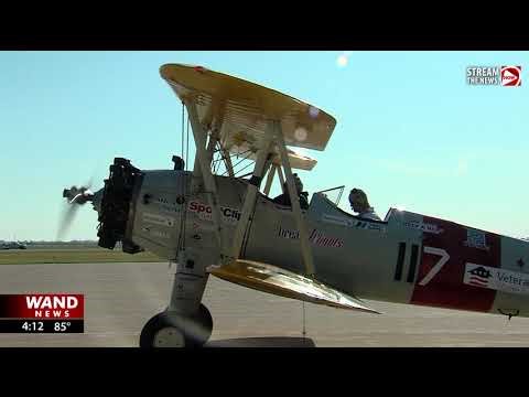 Elderly Veterans Take Dream Flight In 40s Biplane