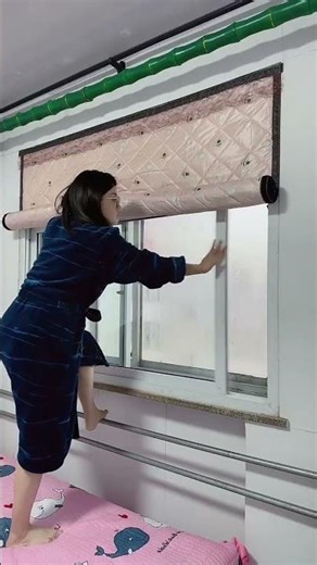 Keep warm under a blanket by the window during winter Leaky window Leaky window letting.