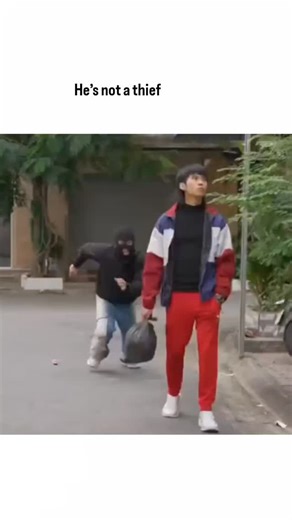 Sugar Crush 🍭 on Instagram: "The video is a lighthearted public-awareness skit that uses humor to deliver a simple environmental message. It opens outdoors with a man dressed like a stereotypical robber—black hoodie, face mask, and a suspicious bag—interacting with a child. He suddenly trips, spilling trash everywhere. Instead of fleeing or acting criminal, he sheepishly gathers the mess and dramatically throws it into a bright yellow trash bin. The exaggerated contrast immediately signals that