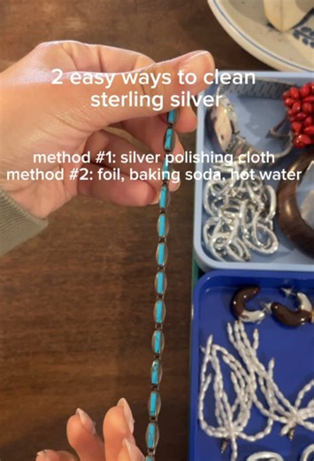 showing y’all two methods of how to quickly clean Sterling silver jewelry that has any tarnish or dirt. The first method is using a silver polishing cloth, which is great for delicate jewelry or just one piece. The second method is better if you have a lot of jewelry that you’re cleaning at once or if there’s a lot of dirt or debris stuck underneath a stone or in between links ##sustainablefashion##thriftedfinds##jewelrytiktok##vintagefashion##jewelryhack