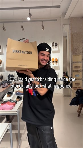 Anfis AKA BABY JESUS on Instagram: "One of the workers booked me to do her manager’s braids inside the Birkenstock store. Next thing I know, they’re gifting me a pair 😭 And if you know me, you know I’m ALWAYS in slides. Dream collab unlocked 😂 I just hope she doesn’t get fired after I post this 😭😂 Should I start braiding in every store I go to now? 😂 #braids #explorepage #viral"