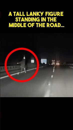 A Tall Lanky Figure Was Standing In The Middle Of The Road…