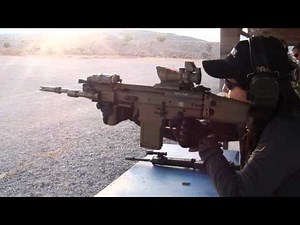 SCAR Heavy 308 battle rifle standing off hand shot by woman