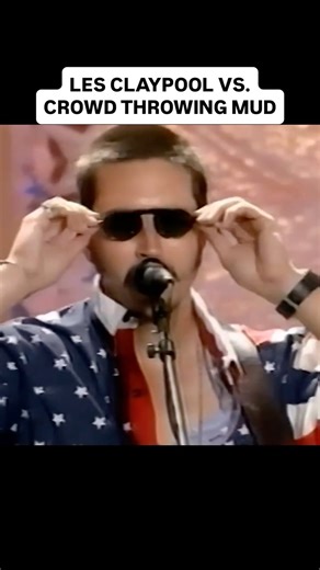 Don’t throw mud at Les Claypool This clip is from Primus’s performance at Woodstock ‘94, the 25th anniversary of the original Woodstock in 1969. Once the band kicked into “My Name is Mud”, the crowd started heaving clumps of mud from the wet ground onto the stage. Among the many reasons that Woodstock ‘94 was a shit show, the storm that hit on the Saturday of the festival, turning the grounds into a mud pit, was one of them But Les Claypool, as you would expect, took this moment of mud slinging 