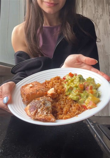 ‏refreshing mango avo salsa salmon rice bowl