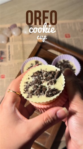 Shanya Sinha on Instagram: "The milk’s favorite cookie cup just got a serious upgrade OREO + MILK + CHOCOLATE. 🍪🥛 ❤️ Steps to make: 👩‍🍳 •Melt: Microwave the Milky Bar until smooth. •Base: Pour a layer of melted chocolate into cupcake mould. •Fill: Add a layer of crushed Oreos and a dollop of Chocolate spread / Nutella. •Cover: Pour more melted chocolate on top and sprinkle with more Oreos. •Set: Chill in the fridge until firm, then peel off the liners. READY TO SAVOUR! 🤍🤍🤍🤍🤍🤍 #oreocook