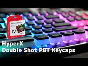I replaced the keycaps with HyperX Double Shot PBT Keycaps and they look amazing!