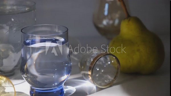 Hard seltzer cocktails with pear. Vodka, Pear fruit brandy. Buffet. A lot of diffferent glasses. Social event in a atmospheric twilight