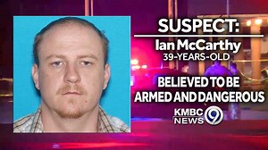 Clinton police officer shot, killed; suspect at large