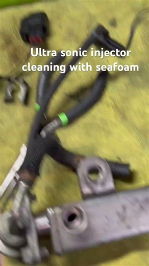 Ultrasonic injector cleaning with Seafoam #evox #automobile #drivetastefully