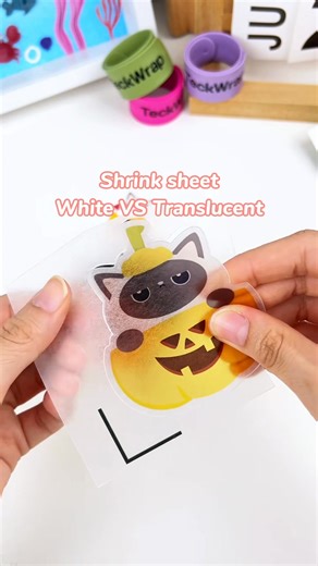 Same design. Two different looks🖤🧡 White VS Translucent Which one do you prefer? Materials ✨TECKWRAP inkjet printable shrink sheet white, translucent ✨Flatten tool (freebie with every shrink sheet purchase) ✨Heat gun ✨TeckWeap tweezer 👉🏻teckwrapcraft.com #teckwrapvinyl #smallbusiness #shrinkplastic #keychain #shrinkydink #diy #cat #pins #giftidea #craft | TeckWrap Craft