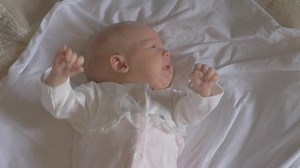 Baby girl crying in her sleep - Free Stock Video
