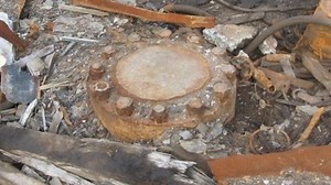 Hidden ‘hell’ underneath rusty lid