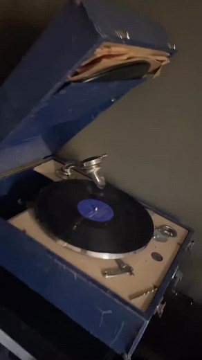 Vintage Turntable Close-Up: A 1942 Musical Journey