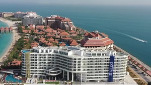 7.1K views · 1.4K reactions | Mina, our flagship beachfront community on The Palm Jumeirah is now officially completed and ready for handover. Highlights from our inauguration and ribbon cutting with our Chairman, Mr Mirwais Azizi, CEO, Farhad Azizi and daughter Mina. We are excited to welcome residents into their new waterfront homes imminently. #palmjumeirah #thepalm #dubai #beachfrontliving #azizi #luxuryhomes | Azizi Developments | Facebook