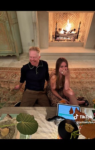 Modern Family Jesse Tyler Ferguson Dinner with Picture of Ty Burrell