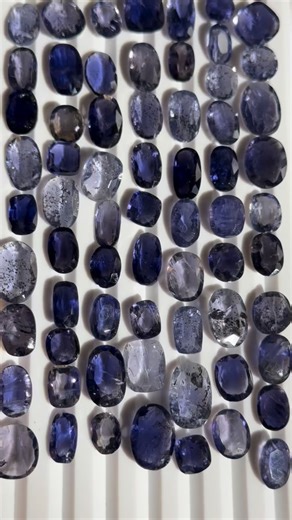 Are you ready for these? . Gem Grade… Iolite Facets from Tanzania! Some with sunstone inclusions! . These “double” gem pieces display a mixture of an attractive bluish violet dichroic color with red hematite platelet inclusions in the iolite half, combined with an orange aventurescence effect from numerous tiny copper-colored hematite platelets in the sunstone half. . Iolite is an amazing stone that is also known as ‘water sapphire’, Cordierite or ‘Vikings’ Compass’! It often exhibits dichromism