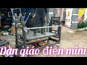 mã 135.Dàn giáo nâng điện 220v mini chế