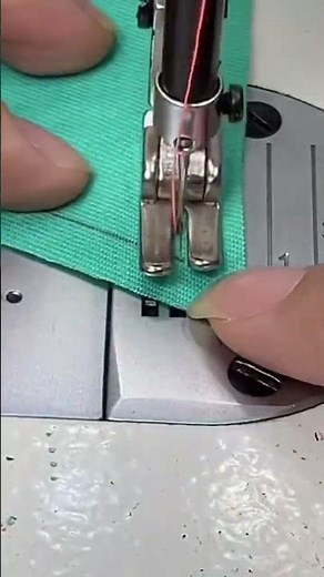 The process of sewing on a fabric using a special sewing machine with very neat results