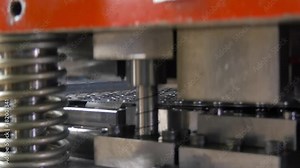 Cutting holes perforation stamping of metal sheets on industrial CNC machine. Automation of work. Refrigeration and ventilation equipment and air conditioners. Modern technologies. 4k.