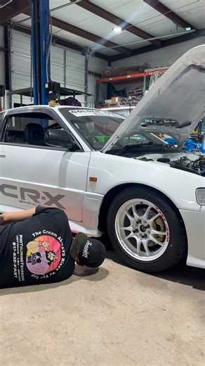 Trying to get the SiR CRX on the road. We’ve had it at a couple shows but limped it there. It needed axles (the SiR fitment of axles is NOT normal and been tough to figure out) and it needed a cooling fan. Got the fan installed but still wasn’t coming on turns out it was wired wrong before we ever got the car. Now accessing the wiring is tough since it’s wire tucked. No biggie just always something @jhpusa #hondacrx #crxsir #jessiesperformance #jdm | Jessie's Performance