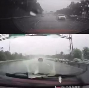 📍 A security car escorting an unidentified VIP crashed into a nearly stopped vehicle on a highway as the convoy attempted to filter between lanes. • The crash caused the driver to scream, a child to cry, and severe damage to the car's rear quarter panel. • In the viral video, cars were seen slowing as a VIP convoy approached, with the sweeper car crashing into a Proton Saga recording the incident. • The incident unfolded in rainy conditions, with the sweeper car accelerating before realising th