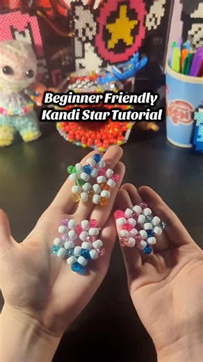 Raven on Instagram: "Beginner friendly Kandi star tutorial! I loved seeing everyone's FNAF cuffs! Y'all did a wonderful job! I love making these tutorials, so lemmie know if there's anything you'd like to learn how to make and I'll try my best! #kandi #highlyrequested #tutorial #star #fidget #beads #bead #craft #crafting #beginnerfriendly"