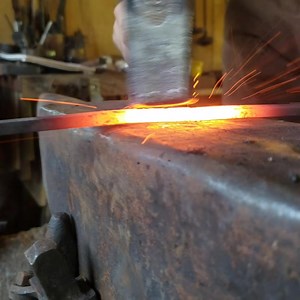 Forge-welding tips: I ain't an expert in forge-welding, but some of my go-to tips include 1. Keep your fire deep, and your piece as high in it as you can and still get the heat you need. 2. Get your metal as hot as you can without burning it. 3. Must look wet to weld. Use flux, and plenty of it. If you can learn later to weld without it more power to ya. Here, I am welding ¼" square stock together, which is great practice. I make a lot of nails out of ¼" square stock, starting with 3" long piece