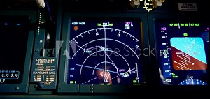 A detailed shot of the radar control and navigation panel in the cockpit of the flight simulator data on the on-board computer