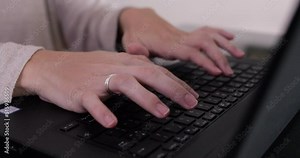 Working with the pc. closeup view of caucasian female hands typewriting with the laptop keyboard.