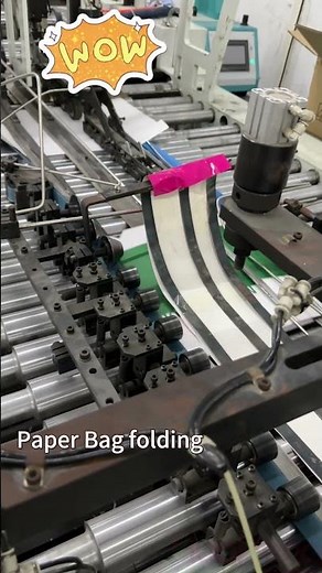 Automatic paper bag folding machine