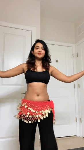 the dancer is Jinu. Discover the captivating world of belly dance through the mesmerizing artistry of our talented dancer. With the grace of Arabic dance and the alluring charm of Shakira-style moves, they effortlessly enrapture audiences. From shimmy to belly roll and belly flutter, each movement is a rhythmic symphony, drawing spectators into the spellbinding allure of this ancient dance form. Their journey began in belly dance classes, where they nurtured their passion and embraced the essenc