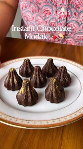 Welcome to the episode 3 of ✨ Mithai Magic ✨ a series where we'll discover the magic of mithai-making together, one recipe at a time! Chocolate Mawa Modak is my favouriteee twist on traditional modaks. Every bite feels like a celebration and it comes together so well❤️✨ Here's how you can make the easiest chocolate mawa modaks at home this Ganesh Chaturthi ☺️ Ingredients : Mawa - 200g Chocolate - 1/4th Cup Pinch of salt Cardamom Pwd - 1/4th Tsp Coffee Pwd - 1/4th Tsp Sugar - 2 Tbsps Cocoa Pwd - 