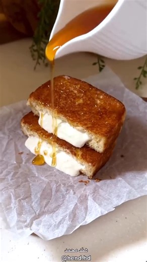 ‎! سنعات للحلويات !‎ on Instagram‎: ". #سنعآت : . فطور لذيذ احفظوه لأجواء الشتاء🌨️ للمزيد من الوصفات ضيفوني👇🏼 @hend.hd خبز بريوش قصيت اطرافه وعملت فتحه في النص بدون مانوصل للاطراف حمرته في زبده من جميع الجهات حشيته قشطه مخلوطه مع جبن شيدر سايل ورشيت عليه عسل جربوه مع شاي ولا الذ 😋بالعافيه⁩ ⸻ 🇺🇸 English A delicious breakfast perfect for cozy winter days 🌨️ For more recipes follow me 👇🏼 @hend.hd Brioche bread – trim the edges and cut an opening in the center without reaching the sides. To