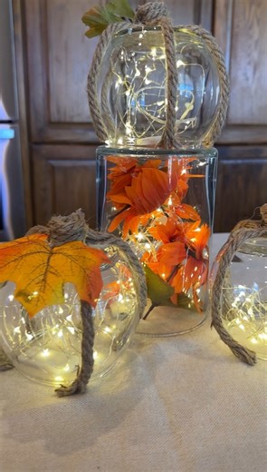 13K views · 16 reactions | Festive DIY Thanksgiving centerpiece Olivia uses round vases, rope, glue, twinkly lights and silk floral to make an easy, beautiful centerpiece. This original video was produced by Network Media LLC and Olivia | Olivia | Facebook
