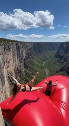MASSIVE INFLATABLE CLIFF JUMP GOES WRONG 😱 #ExtremeJump #FearFactor