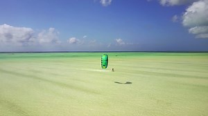 5.5K views · 150 reactions | Season Started! You are welcome to our beautiful lagoon Drone: Rafa Fidalgo Rider: Sara Cerqueira on North Kiteboarding International Dice | Kite Centre Zanzibar | Facebook