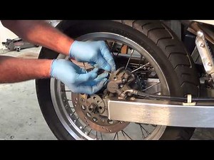 Suzuki DR650 rear brake pad replacement