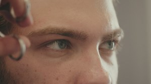 Man gets haircut from stylist - Free Stock Video