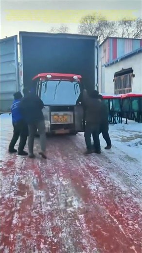 Hauling Hard Work: How a Team Loads a Tricycle into a Truck