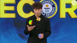 Chinese man creates Guinness World Record by solving three Rubik's Cubes while juggling them