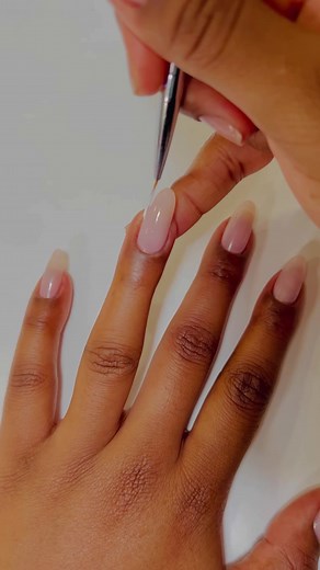 Ring in the new year with these shimmery pearl nails! @brushedbyb_ on IG used two of our fave shades to create this dreamy nail art look: #BubbleBath & #KyotoPearl 🤍🛁 Shop here: https://www.opi.com/shop-products/nail-polish-powders/long-lasting-nail-polish/bubble-bath & https://www.opi.com/shop-products/nail-polish-powders/long-lasting-nail-polish/kyoto-pearl #OPI #OPIObsessed #PearlNails #ShimmeryNails #nailart #DIY #DIYMani #OPIBubbleBath #nyenails #nailinspo | OPI