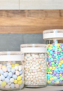 8.6K views · 54 reactions | Hop to #TheContainerStore to find the canisters you need to decant your Easter treats!  Tidy Style used the Guzzini Blanca Glass Canisters to keep candy fresh and ready for use. Each lift-off lid is designed to fit into the base of another canister, so you can stack them on a countertop or in a pantry. SHOP online: https://container.store/3Mr2oPl | The Container Store | Facebook