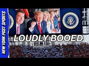 Donald Trump waves to jumbotron at Texas-Tennessee game